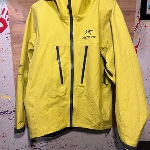Arc'teryx Vibrant Yellow Jacket with Black Accents